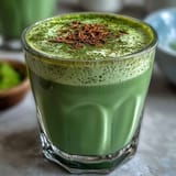 Deliciously frothy matcha oat milk latte, perfect for a mindful morning drink.
