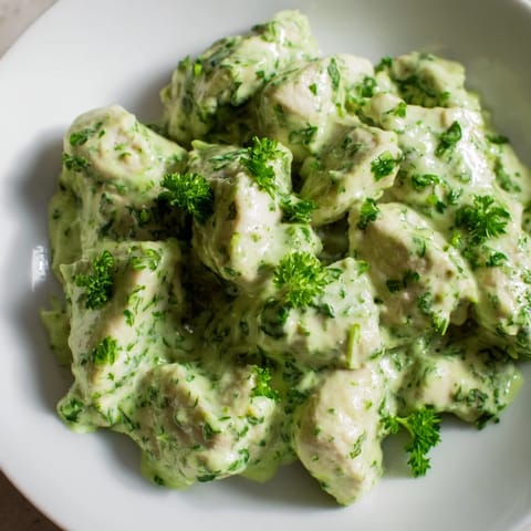 Fresh Green Goddess Chicken Salad features juicy herb-roasted chicken on crisp greens, drizzled with tangy yogurt dressing.  