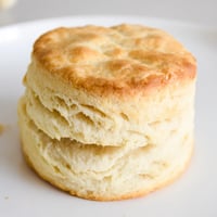 Golden, flaky buttermilk biscuits, perfect for breakfast with jam or honey, fresh from the oven.